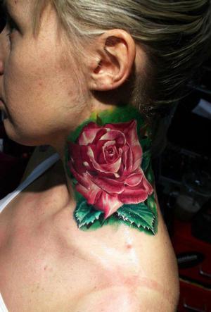 rose tat on neck