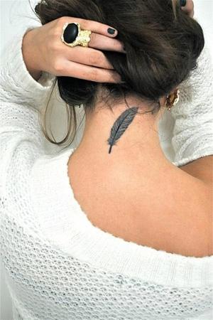 miniature feather tattoo back of neck