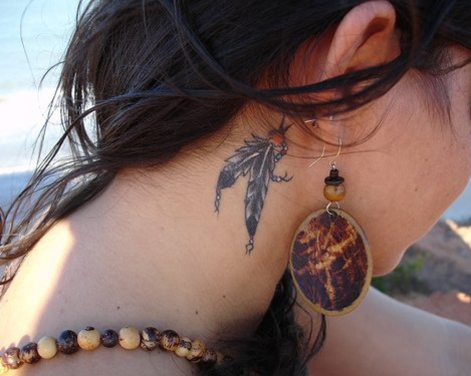 Small Dreamcatcher Tattoos Behind Ear