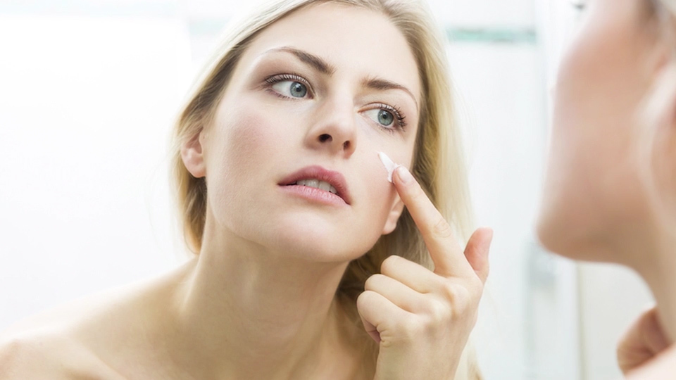 Priming Moisturizer Woman With Her Face