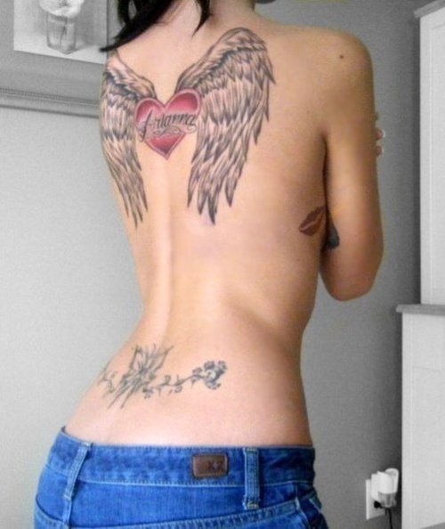Side Lower Back Tattoo