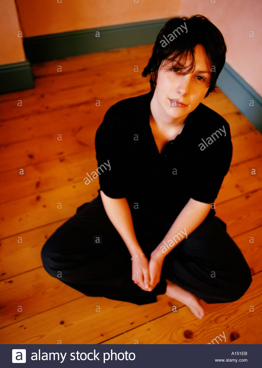 Teen Girl Sitting Cross Legged