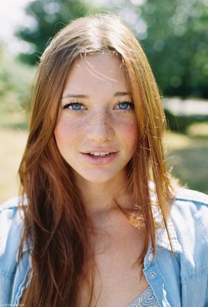 charming woman with freckles