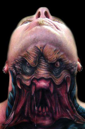 predator neck tattoo