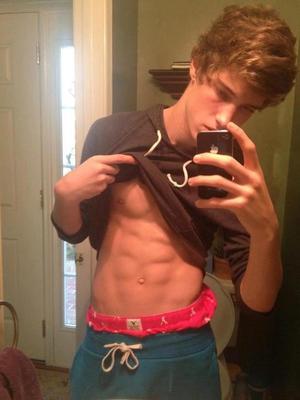 super-cute teenager dude mirror selfie six pack