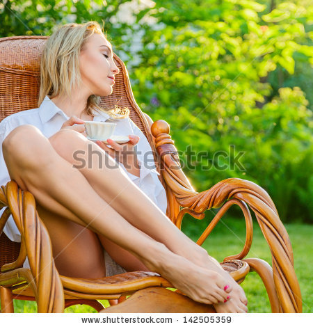 Woman Sitting On Recliner Chair