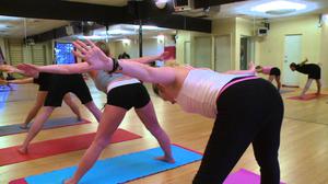 girl bent over in yoga pants g-string